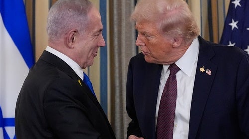 Israel's Prime Minister Benjamin Netanyahu shakes hands with President Donald Trump after a news conference at the White House on September 29, 2025.
