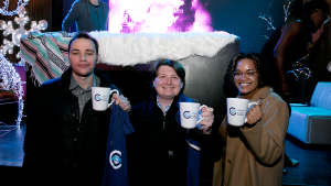 YP members show off their prizes at the 2022 YP Global Trivia Bowl.